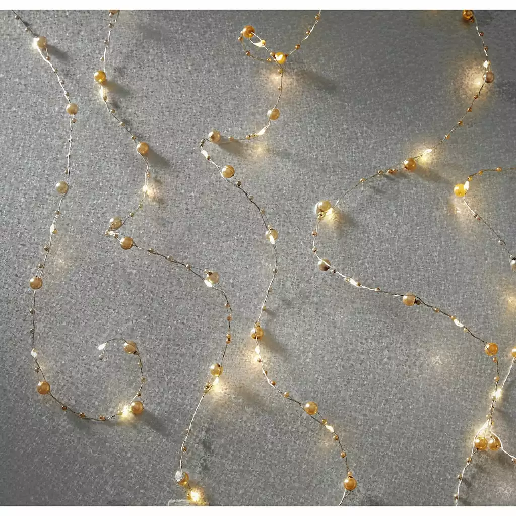 Flash Sale ✔️ 12 Pack: 40ct. Warm White Gold Pearl LED String Lights by Ashland® 🥰 4 Flash Sale ✔️ 12 Pack: 40ct. Warm White Gold Pearl LED String Lights by Ashland® 🥰 - Image 2